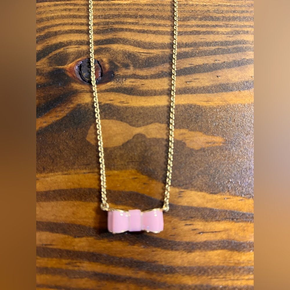 Kate Spade Pink and Gold Bow Necklace gold tone with pink enamel bow feminine